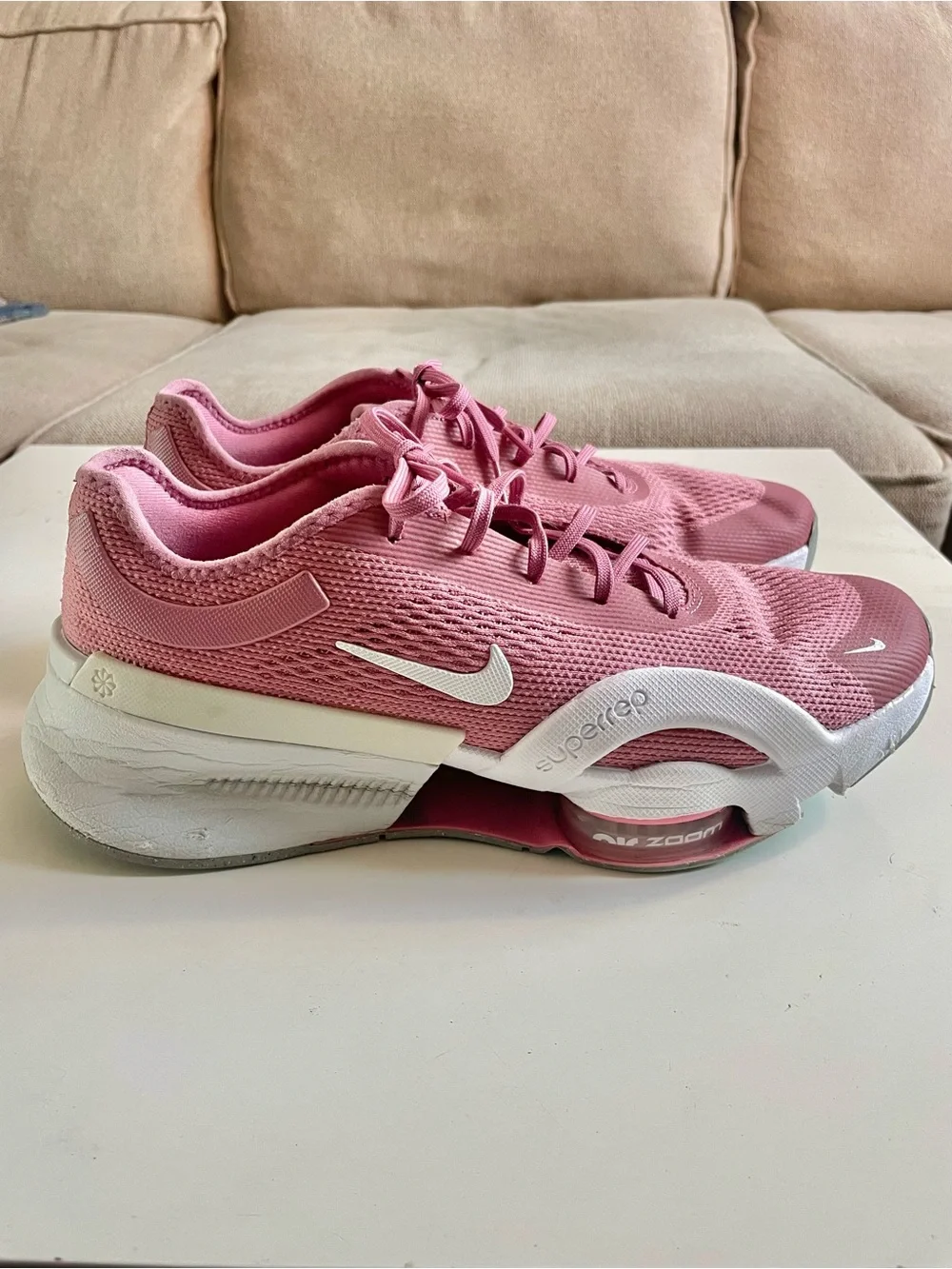 Nike Women's Pink Athletic Training Shoes with White Swoosh